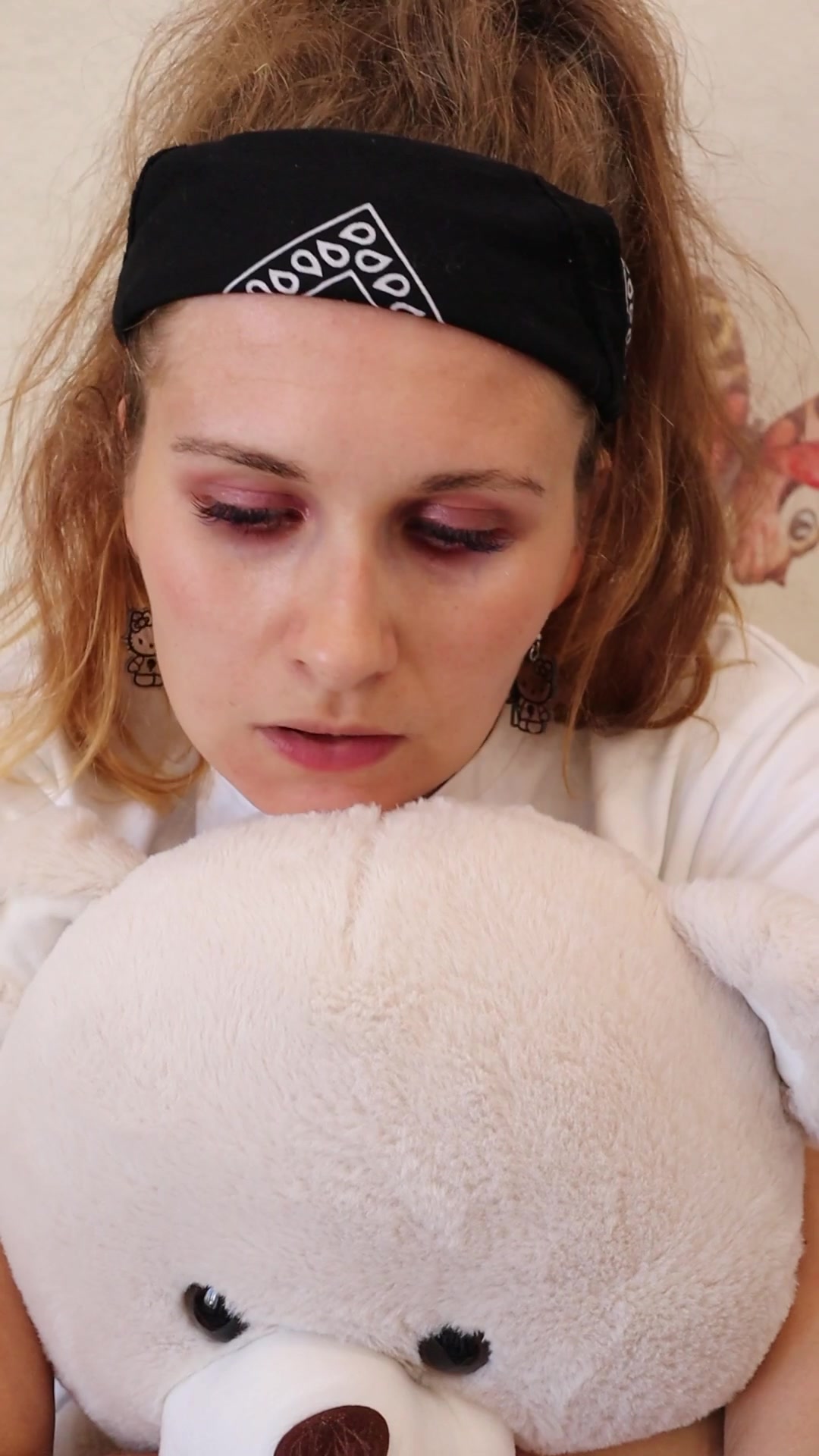 The text on the headband is "Adidas".