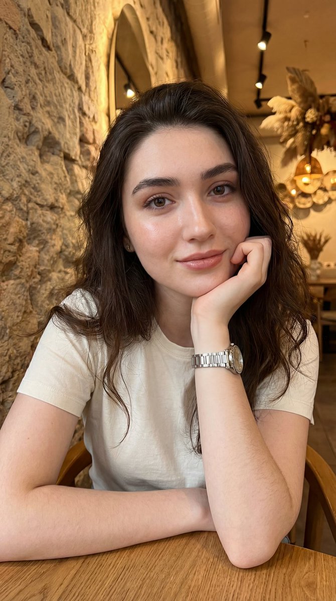 Natural Portrait of Woman in Cafe - Friendly Close-up