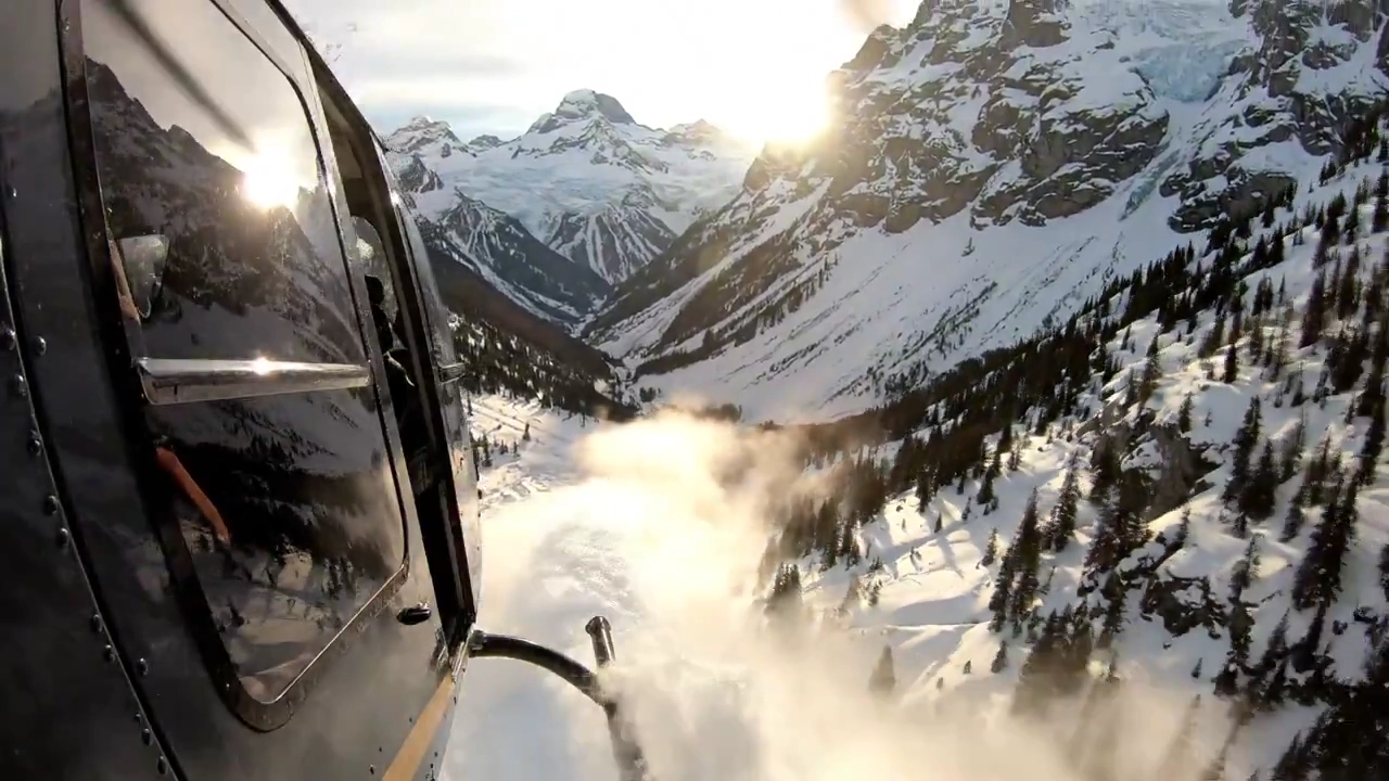 Aerial Alpine Adventure: Snow and Sunlight