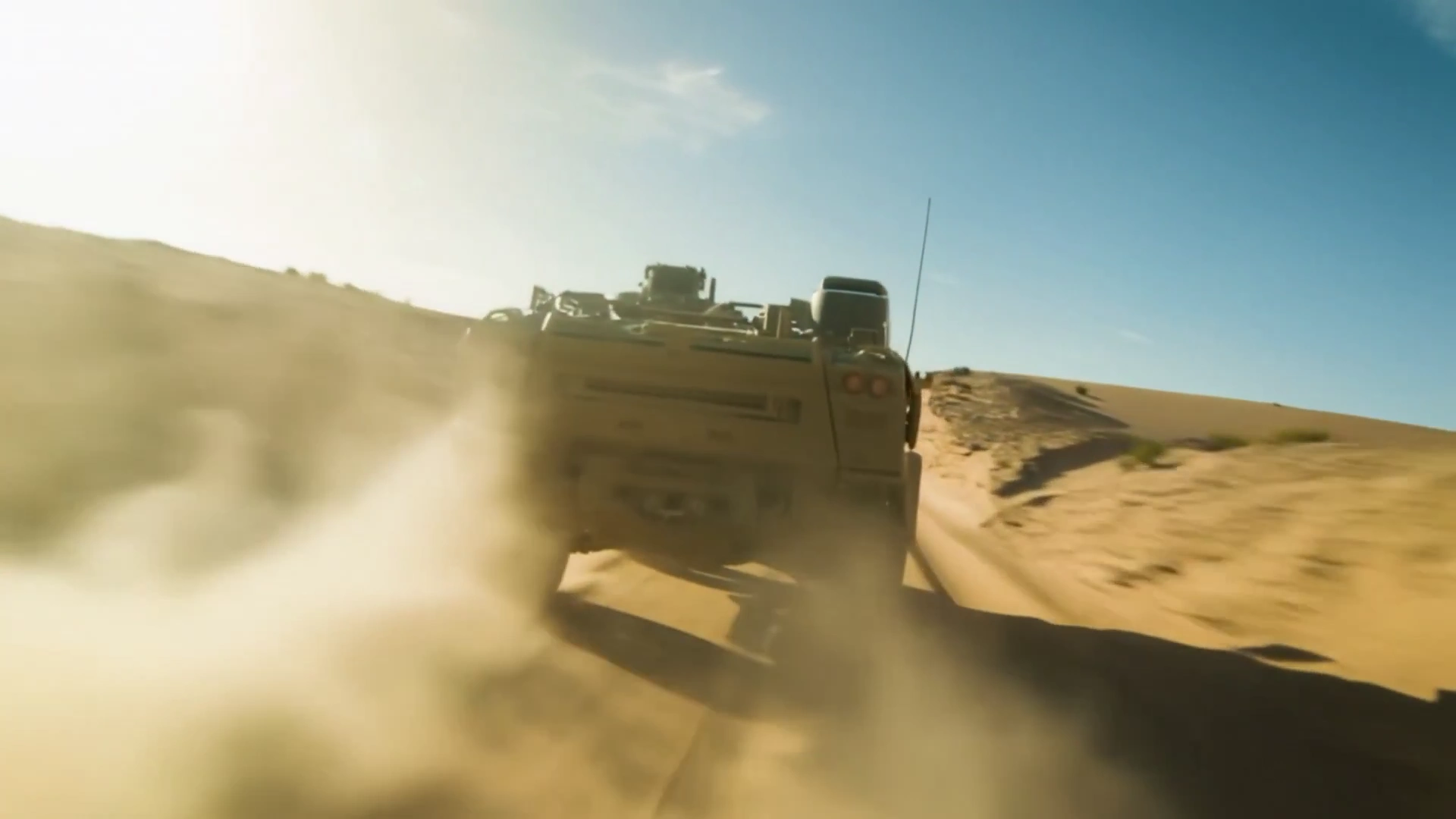 Desert Convoy: Armored Vehicle in High-Speed Chase