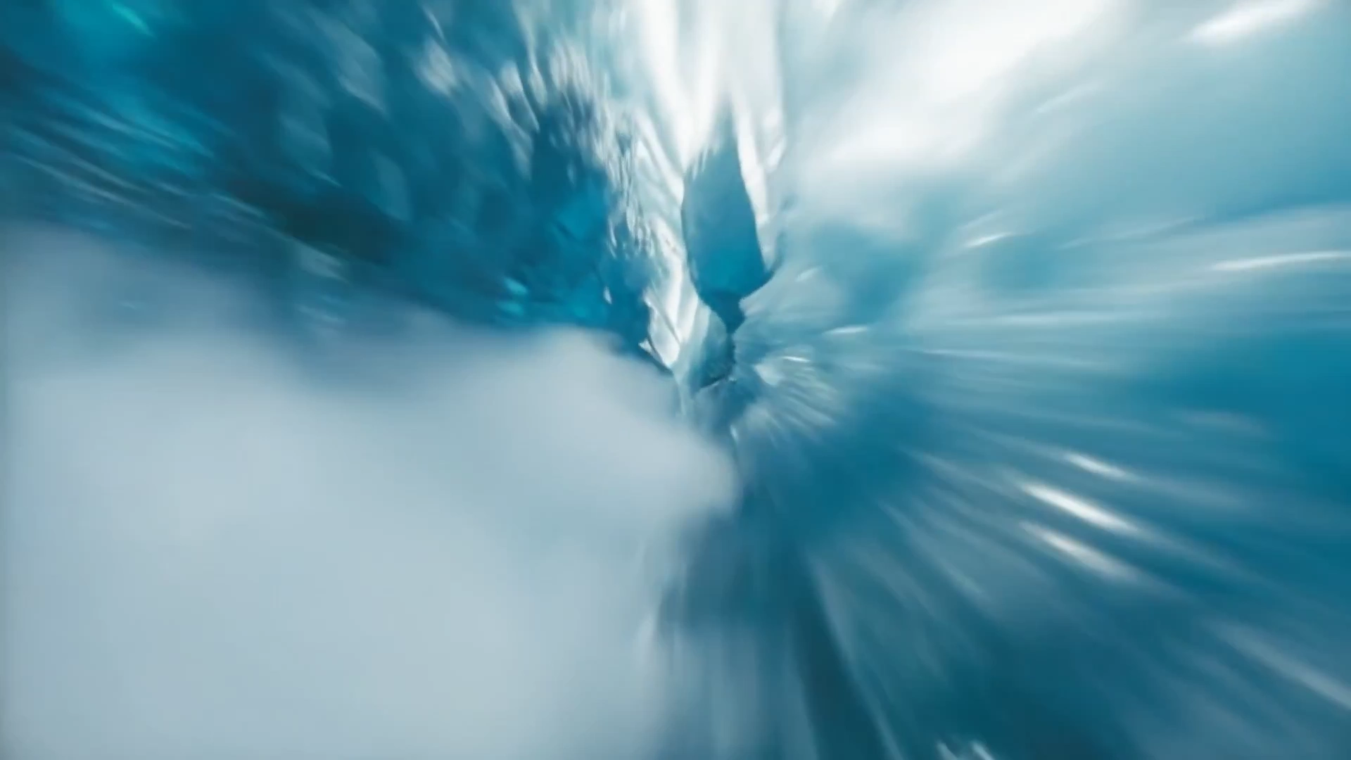 Thrilling Descent Through a Blue Ice Cavern