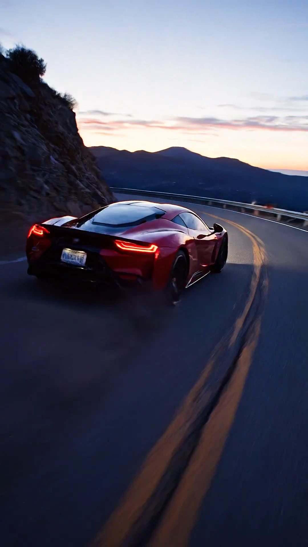 Twilight Thrill: A Red Racer's Mountain Ascent